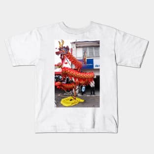 A cruled long red dragon on a Chinese New Year festival on a street in Georgetown. Kids T-Shirt